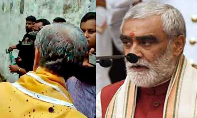 মন্ত্রীর গায়ে কালি ছিটালেন ক্ষুব্ধ জনতা
