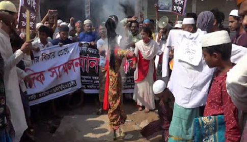 আশুলিয়ায় স্বামী হত্যার ঘটনায় স্ত্রীসহ আসামীদের ফাঁসির দাবিতে বিক্ষোভ