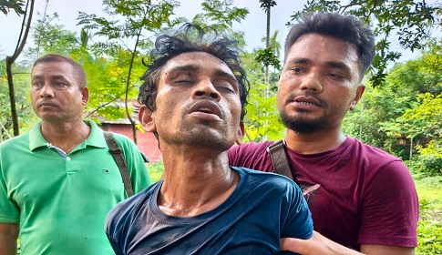 এএসআই সুজাউল হত্যা মামলার পলাতক আসামি অস্ত্র-ইয়াবাসহ গ্রেফতার