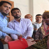 পাংশায় পবিত্র ঈদ-উল-আযহা উপলক্ষ্যে ভিজিএফ এর চাউল বিতরণ