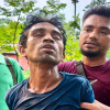 এএসআই সুজাউল হত্যা মামলার পলাতক আসামি অস্ত্র-ইয়াবাসহ গ্রেফতার