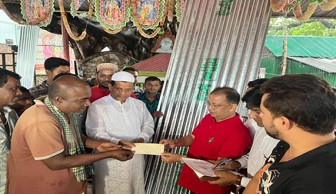সাভারে আদিবাসীদের মাঝে ঢেউটিন ও চেক বিতরণ