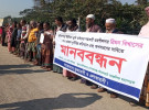 মুকসুদপুরে ভূমিকর্মকর্তার বিরুদ্ধে এলাকাবাসির মানববন্ধন