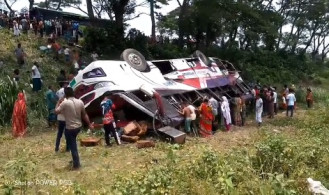 নগরকান্দায় যাত্রীবাহী বাস নিয়ন্ত্রণ হারিয়ে খাদে, আহত ১৫