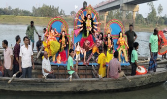 সোনাতলায় বাঙালি নদীতে প্রতিমা বিসর্জন