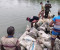 শ্যামনগরে উদ্ধারকৃত ৭৭ বস্তা ঝিনুক মালঞ্চ নদীতে অবমুক্ত